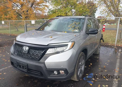 2019 Honda Passport Touring z USA, uszkodzony, nr VIN 5FNYF8H99KB011697